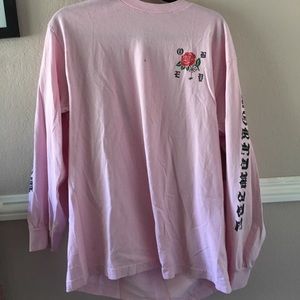 Pink men obey top has ink on it